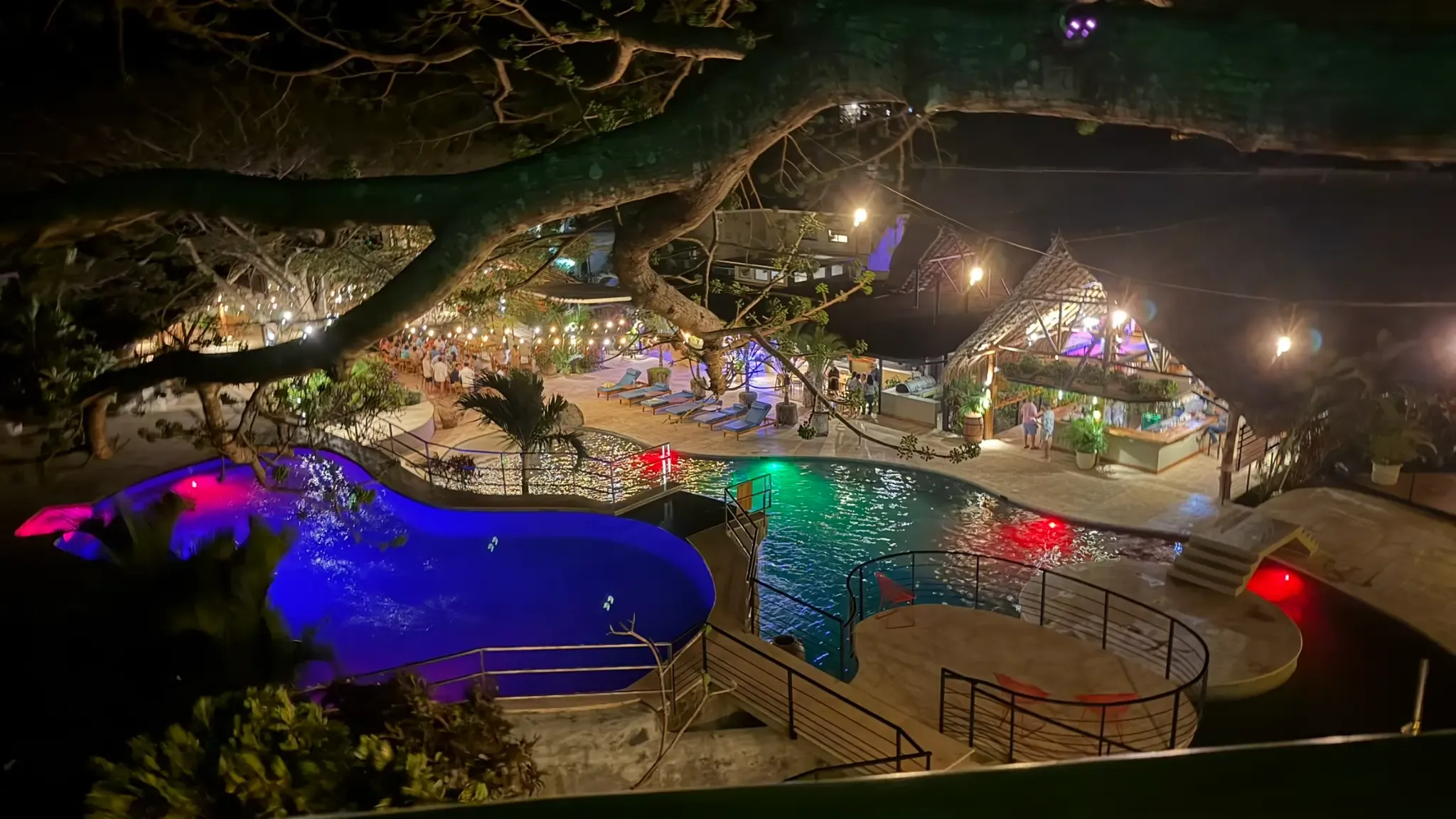 The pools lit up at night with colourful lights, a magical atmosphere