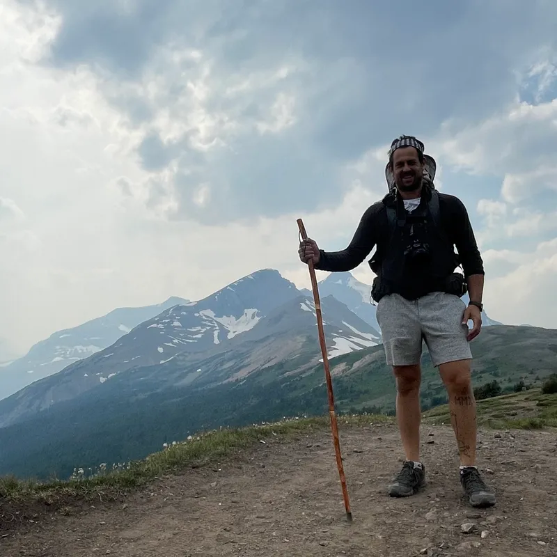 Panoramic mountain views open up as you climb above the treeline