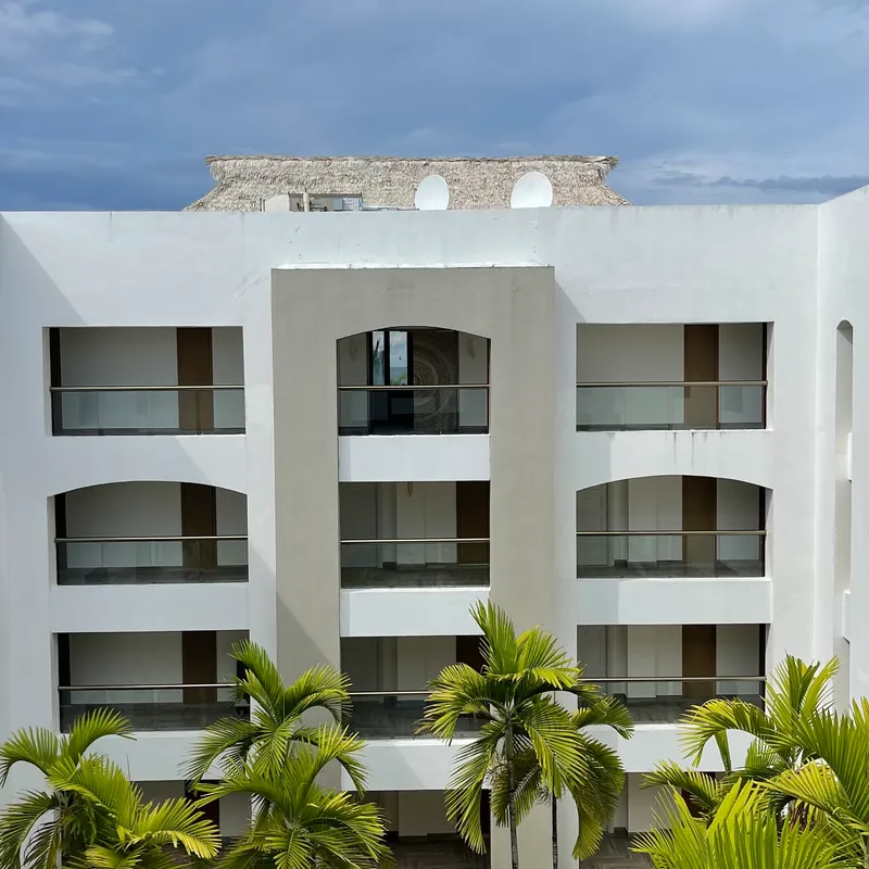 Resort building with tropical landscaping