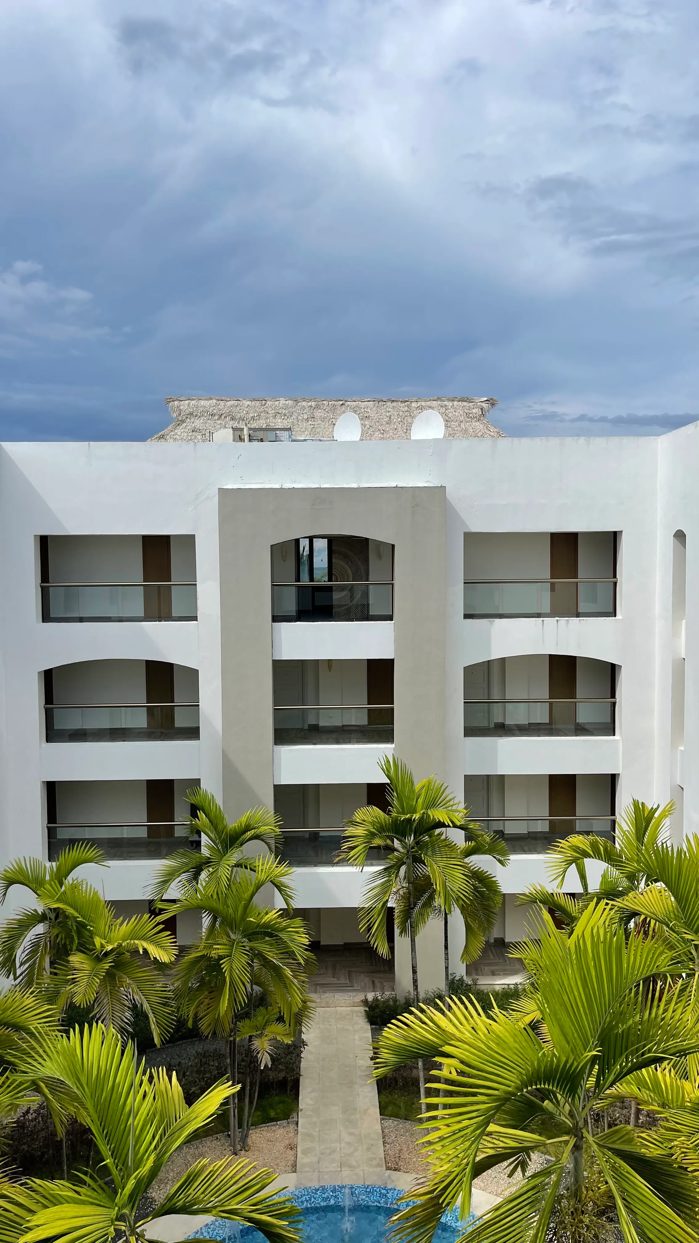 Resort building with tropical landscaping