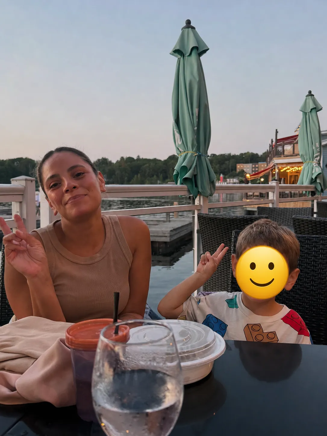 Mom and son enjoying sunset dinner at Dock of the Bay Muskoka