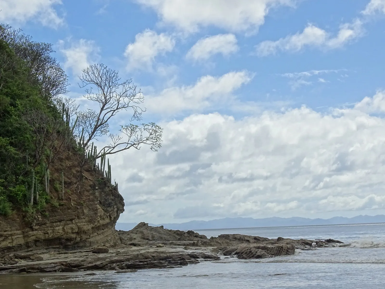 Rocky tropical shoreline at Playa Hermosa south of San Juan del Sur
